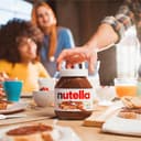 Nutella - Crema Spalmabile alle Nocciole e Cacao, Senza Glutine, Conservanti e Grassi Idrogenati, Ideale a Colazione, Vasetto da 600 gr - 3