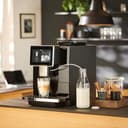 Tchibo Office Kaffeevollautomat mit Wasserfilter, Keramikmahlwerk, Farb-Touchdisplay, 1500 Watt, cremige Milchschaumfunktion, 2 L Wassertank, 30 Tassen am Tag, Schwarz - 6
